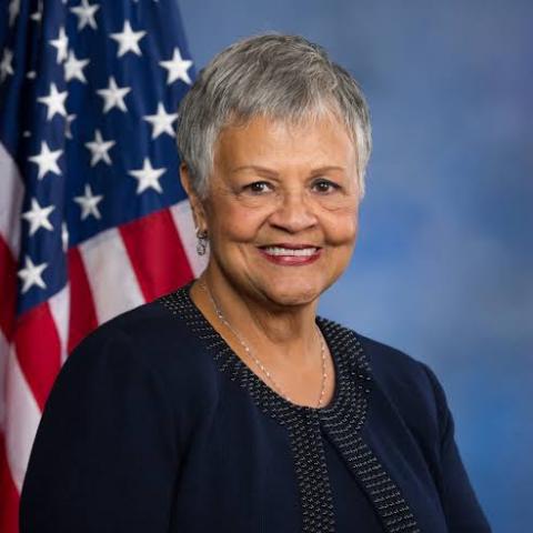 Official photo of Bonnie Watson Coleman in front of an American flag